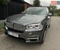 Сірий БМВ Х5, об'ємом двигуна 2 л та пробігом 235 тис. км за 23000 $, фото 4 на Automoto.ua