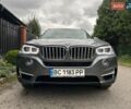 Сірий БМВ Х5, об'ємом двигуна 2 л та пробігом 235 тис. км за 23000 $, фото 1 на Automoto.ua
