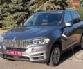 Серый БМВ Х5, объемом двигателя 2 л и пробегом 170 тыс. км за 23999 $, фото 1 на Automoto.ua
