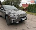 Сірий БМВ Х5, об'ємом двигуна 2 л та пробігом 235 тис. км за 23000 $, фото 1 на Automoto.ua