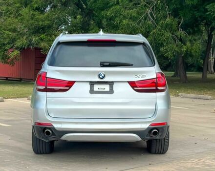 Серый БМВ Х5, объемом двигателя 3 л и пробегом 75 тыс. км за 21500 $, фото 4 на Automoto.ua