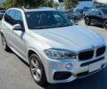 Серый БМВ Х5, объемом двигателя 3 л и пробегом 79 тыс. км за 19200 $, фото 2 на Automoto.ua