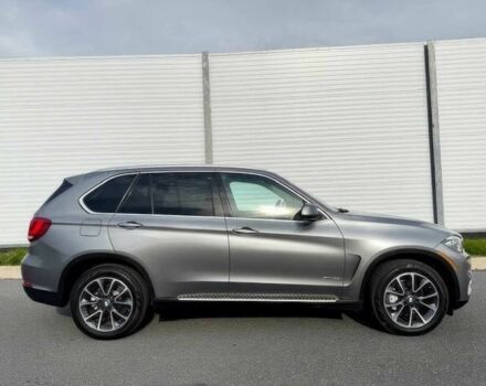 Серый БМВ Х5, объемом двигателя 3 л и пробегом 73 тыс. км за 6800 $, фото 3 на Automoto.ua