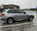Серый БМВ Х5, объемом двигателя 3 л и пробегом 48 тыс. км за 23800 $, фото 1 на Automoto.ua