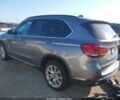 Сірий БМВ Х5, об'ємом двигуна 3 л та пробігом 54 тис. км за 6400 $, фото 2 на Automoto.ua