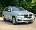 Серый БМВ Х5, объемом двигателя 3 л и пробегом 75 тыс. км за 21500 $, фото 1 на Automoto.ua