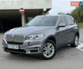 Серый БМВ Х5, объемом двигателя 2 л и пробегом 243 тыс. км за 27000 $, фото 4 на Automoto.ua