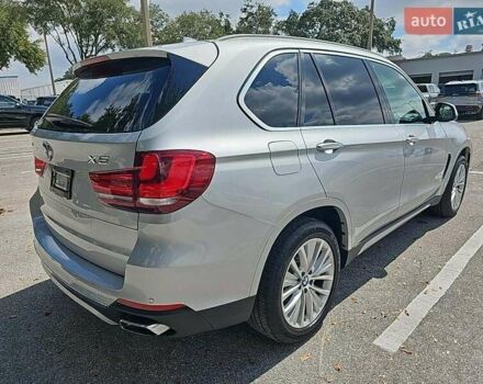Серый БМВ Х5, объемом двигателя 2 л и пробегом 119 тыс. км за 22950 $, фото 3 на Automoto.ua