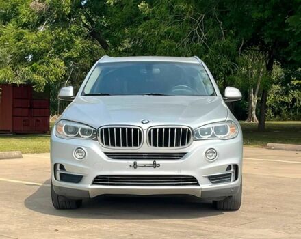 Серый БМВ Х5, объемом двигателя 3 л и пробегом 75 тыс. км за 21500 $, фото 1 на Automoto.ua
