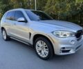 Сірий БМВ Х5, об'ємом двигуна 3 л та пробігом 74 тис. км за 18600 $, фото 2 на Automoto.ua