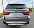 Серый БМВ Х5, объемом двигателя 3 л и пробегом 73 тыс. км за 6800 $, фото 5 на Automoto.ua