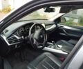 Серый БМВ Х5, объемом двигателя 2 л и пробегом 175 тыс. км за 19700 $, фото 6 на Automoto.ua