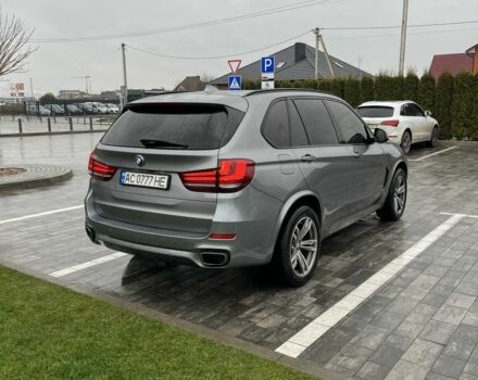 Серый БМВ Х5, объемом двигателя 3 л и пробегом 48 тыс. км за 23800 $, фото 2 на Automoto.ua