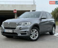 Серый БМВ Х5, объемом двигателя 2 л и пробегом 243 тыс. км за 27000 $, фото 1 на Automoto.ua