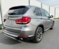 Серый БМВ Х5, объемом двигателя 3 л и пробегом 73 тыс. км за 6800 $, фото 4 на Automoto.ua