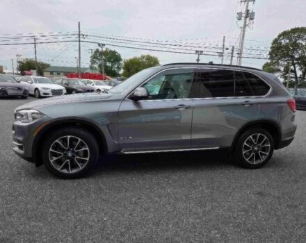 Серый БМВ Х5, объемом двигателя 3 л и пробегом 72 тыс. км за 19700 $, фото 4 на Automoto.ua