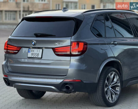 Серый БМВ Х5, объемом двигателя 3 л и пробегом 153 тыс. км за 24800 $, фото 5 на Automoto.ua