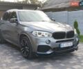 Серый БМВ Х5, объемом двигателя 2 л и пробегом 170 тыс. км за 31200 $, фото 1 на Automoto.ua