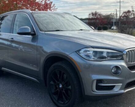 Серый БМВ Х5, объемом двигателя 3 л и пробегом 58 тыс. км за 25000 $, фото 2 на Automoto.ua