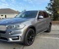 Серый БМВ Х5, объемом двигателя 3 л и пробегом 58 тыс. км за 25000 $, фото 1 на Automoto.ua