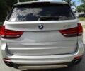 Сірий БМВ Х5, об'ємом двигуна 3 л та пробігом 59 тис. км за 16700 $, фото 4 на Automoto.ua