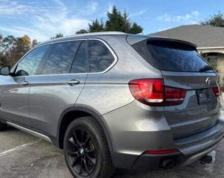 Серый БМВ Х5, объемом двигателя 3 л и пробегом 58 тыс. км за 25000 $, фото 3 на Automoto.ua