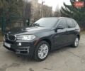 Серый БМВ Х5, объемом двигателя 3 л и пробегом 229 тыс. км за 27499 $, фото 2 на Automoto.ua