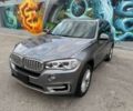 Серый БМВ Х5, объемом двигателя 3 л и пробегом 67 тыс. км за 20500 $, фото 2 на Automoto.ua