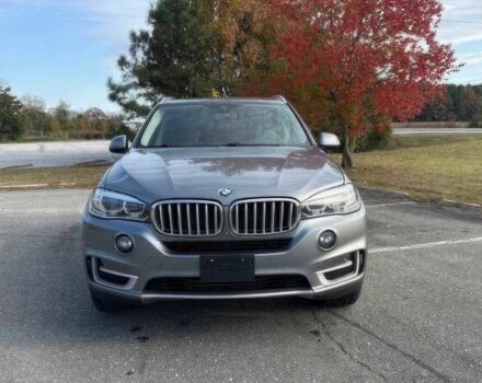 Серый БМВ Х5, объемом двигателя 3 л и пробегом 58 тыс. км за 25000 $, фото 1 на Automoto.ua