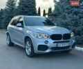 Серый БМВ Х5, объемом двигателя 2 л и пробегом 182 тыс. км за 32500 $, фото 1 на Automoto.ua