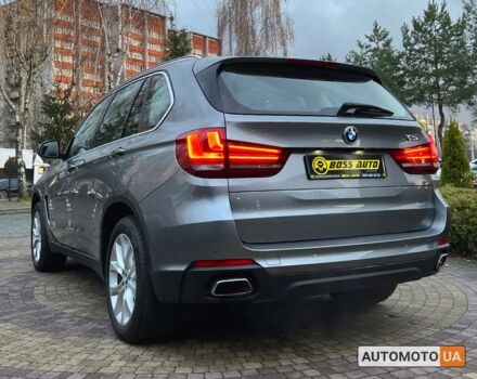 Серый БМВ Х5, объемом двигателя 3 л и пробегом 186 тыс. км за 32500 $, фото 4 на Automoto.ua
