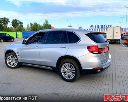 Серый БМВ Х5, объемом двигателя 3 л и пробегом 117 тыс. км за 32500 $, фото 2 на Automoto.ua