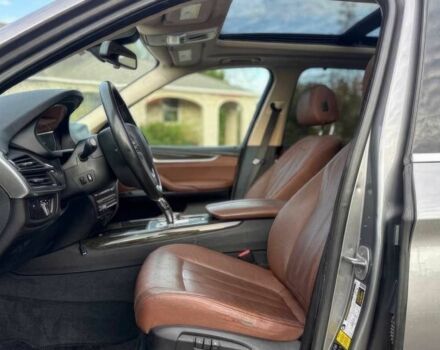 Серый БМВ Х5, объемом двигателя 3 л и пробегом 58 тыс. км за 25000 $, фото 5 на Automoto.ua