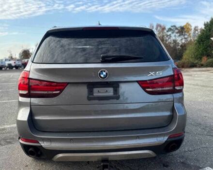 Серый БМВ Х5, объемом двигателя 3 л и пробегом 58 тыс. км за 25000 $, фото 4 на Automoto.ua