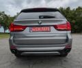 Серый БМВ Х5, объемом двигателя 3 л и пробегом 200 тыс. км за 22999 $, фото 14 на Automoto.ua