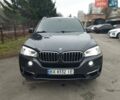 Серый БМВ Х5, объемом двигателя 3 л и пробегом 229 тыс. км за 27499 $, фото 1 на Automoto.ua