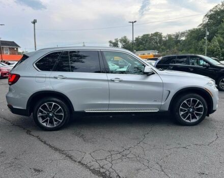 Серый БМВ Х5, объемом двигателя 3 л и пробегом 40 тыс. км за 8500 $, фото 6 на Automoto.ua