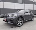 Серый БМВ Х5, объемом двигателя 3 л и пробегом 107 тыс. км за 57990 $, фото 1 на Automoto.ua