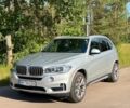 Сірий БМВ Х5, об'ємом двигуна 3 л та пробігом 101 тис. км за 26800 $, фото 1 на Automoto.ua