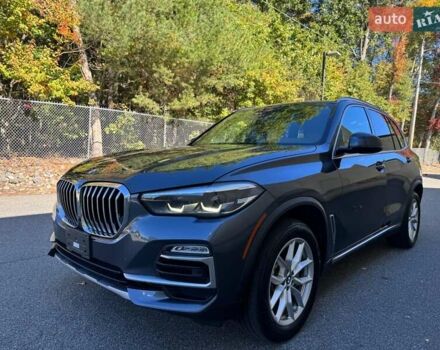 Сірий БМВ Х5, об'ємом двигуна 3 л та пробігом 161 тис. км за 18700 $, фото 1 на Automoto.ua