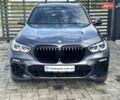 Серый БМВ Х5, объемом двигателя 3 л и пробегом 143 тыс. км за 71900 $, фото 1 на Automoto.ua