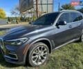 Серый БМВ Х5, объемом двигателя 3 л и пробегом 230 тыс. км за 33899 $, фото 1 на Automoto.ua