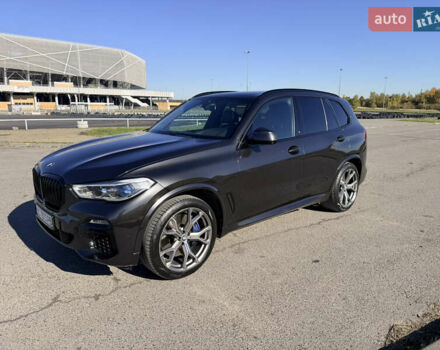 Серый БМВ Х5, объемом двигателя 3 л и пробегом 65 тыс. км за 57900 $, фото 3 на Automoto.ua