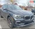 Сірий БМВ Х5, об'ємом двигуна 3 л та пробігом 115 тис. км за 25000 $, фото 1 на Automoto.ua
