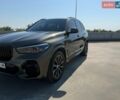 Серый БМВ Х5, объемом двигателя 3 л и пробегом 50 тыс. км за 65500 $, фото 1 на Automoto.ua