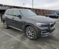 Серый БМВ Х5, объемом двигателя 3 л и пробегом 56 тыс. км за 40000 $, фото 3 на Automoto.ua