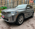 Серый БМВ Х5, объемом двигателя 3 л и пробегом 65 тыс. км за 68500 $, фото 1 на Automoto.ua