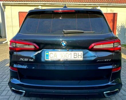 Серый БМВ Х5, объемом двигателя 3 л и пробегом 75 тыс. км за 67000 $, фото 2 на Automoto.ua