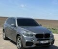Серый БМВ Х5, объемом двигателя 3 л и пробегом 140 тыс. км за 26700 $, фото 1 на Automoto.ua