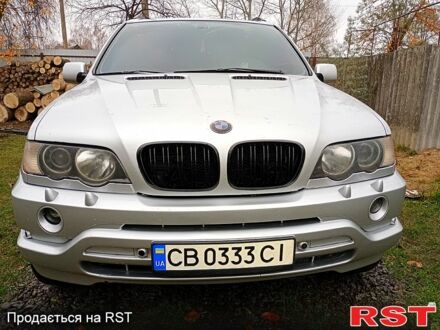 Серый БМВ Х5, объемом двигателя 3 л и пробегом 300 тыс. км за 8000 $, фото 1 на Automoto.ua